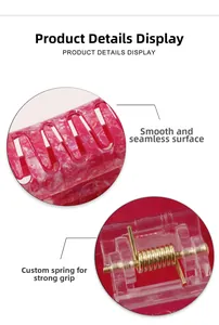 Detail view of large hair claw clip with pink ink texture and strong metal spring