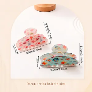 Ocean theme hair claw clips featuring starfish and shells motifs in a set of two colors
