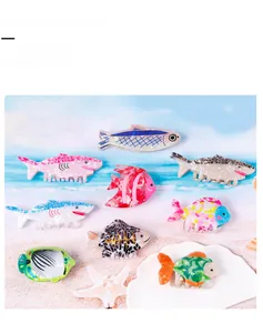 Collection of various tropical fish hair claw clips made of colorful acetate material