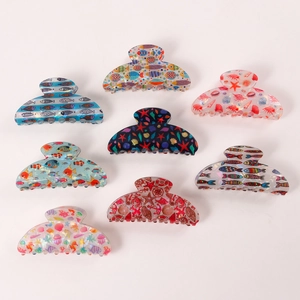 Ocean theme hair claws with starfish and seashell patterns for various hairstyles