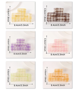 Detailed size chart showing dimensions for large checkered hair claws in various colors