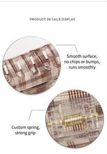 Detail view of plaid hair claw clip showing smooth edges and strong custom metal spring