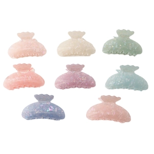 Set of 8 colorful petal-shaped candy color hair claws with a shimmering glitter finish