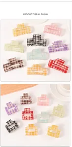 Detailed macro view of colorful plaid pattern hair clips in rectangular and square shapes
