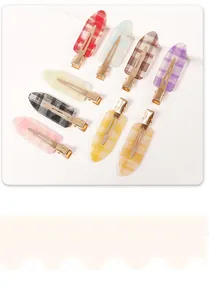 Detailed set of nine colorful plaid pattern hair clips with premium golden metal finish