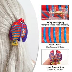 Pince à cheveux poisson tropical aux rayures orange bleu avec ressort métallique