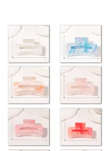 Detail view of rectangular hair claws in six colors with marble texture and dimensions