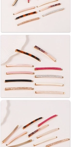 Detailed close-up of acrylic resin hair clips in tortoiseshell and glitter finishes