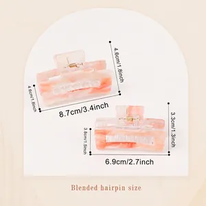 French style star nebula hair claw set in pink and cream marble acetate textures