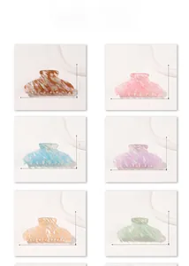 Set of six colorful hair claws in marble texture with precise 10.2cm length measurements
