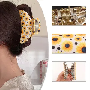 Grande pince à cheveux tournesol avec pois noirs et ressort en métal pour cheveux épais