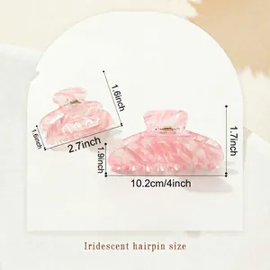 Iridescent pink hair claw clips in large and small sizes with detailed dimensions