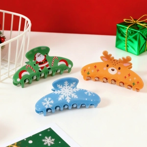 Christmas hair claw clips set featuring Santa Claus, reindeer, and snowflake patterns