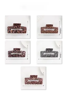 Detailed size view showing leopard print hair claws in five colors with dimensions