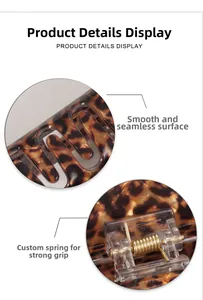 Detail of leopard print hair claw clip showing polished resin finish and metal spring