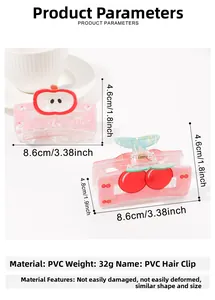 Detail showing PVC cherry and apple hair clips with dimensions of 8.6cm x 4.6cm
