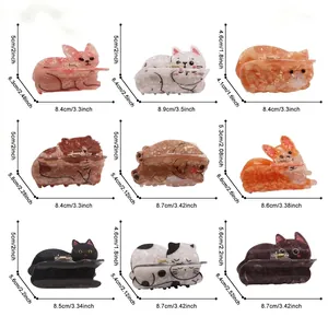 Size chart showing dimensions for 9 cute cat and dog hair claw clips in cm and inches