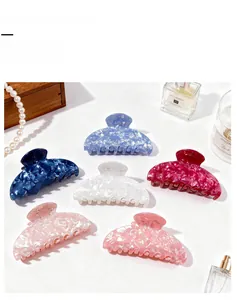 Detail showing high-quality colorful mica texture hair claw clips in six elegant colors