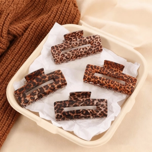 Set of four leopard print large hair claws with rectangular hollow design for women