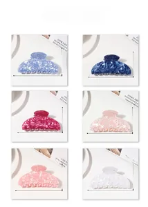Detailed set of large hair claw clips in colorful crushed ice marble patterns