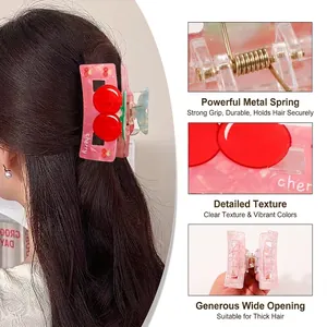 Pink acetate hair claw clip with red cherry decor and cherry lettering for women