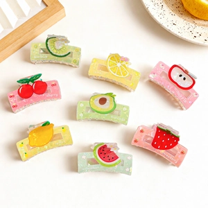 Cute fruit hair claws set in colorful acrylic with cherry strawberry and lemon patterns