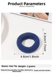 Detail view of blue elastic hair tie showing dimensions 4.6cm x 4.3cm and 3g weight