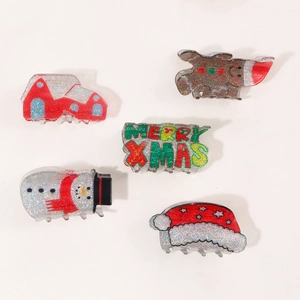 Christmas glitter hair claw clips set including gingerbread man and snowman festive hair accessories