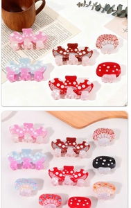 Detail of mushroom hair clips with white polka dots and textured gills in various colors