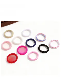 Lot de 10 chouchous colorés à haute élasticité avec motifs de cœur et fils pailletés