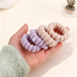 Elastic fabric hair ties with white pearls in purple and beige for ponytails