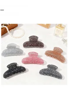 Pinze per capelli glitterate in sei colori con profumo elegante e perle ben disposte