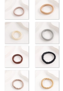 Detail of high-elasticity hair ties in Morandi colors with ribbed and smooth textures