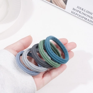 Seamless high-elasticity nylon hair ties in muted colors with soft ribbed texture