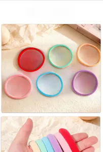 Detail view showing colorful seamless elastic hair ties with high-stretch nylon material