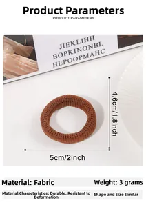 Detail showing the coffee-colored knitted hair tie texture and 5cm size dimensions