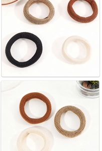 Close-up of high-elastic ribbed knit hair ties in assorted neutral colors like beige and brown