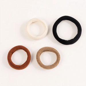 Set of four high-elastic ribbed knit hair ties in cream, black, brown, and tan tones