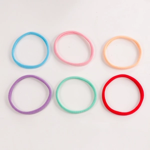 Set of six colorful seamless velvet hair ties in macaron colors for women's hairstyles