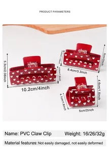 Three red heart print claw clips in various sizes for stylish hair styling options