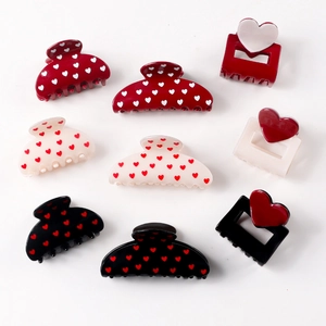 Elegant heart-shaped shark hair clips set in burgundy, cream, and black for women