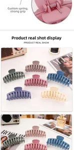 Detail view of large matte hair claw clip with custom metal spring for strong grip