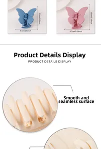 Detailed view of matte butterfly hair claw clip featuring dimensions 6.7cm by 5.8cm