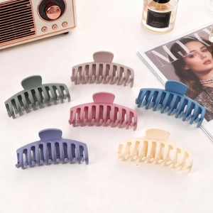 Set of 6 matte Morandi large hair claw clips in various colors on a white background