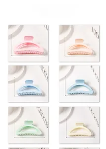 Macro shot showing dimensions of macaron colored matte hair claws in a 2x3 grid layout