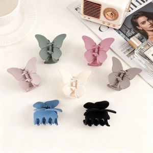 Set of 7 matte butterfly hair claws in Morandi colors for women's elegant hairstyling