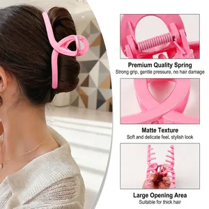 Grande molletta per capelli rosa opaca con design a incrocio e molla in metallo