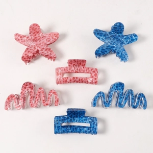 Starfish and wave pattern hair claw clips set in pink and blue leopard textures