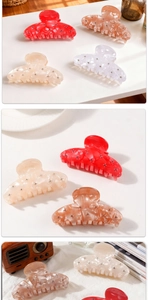 Detailed close-up of large pastel hair claws with sparkling rhinestones in various colors
