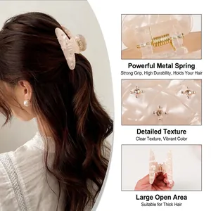Elegant champagne pearl hair claw with rhinestones shown in model hair and detail shots